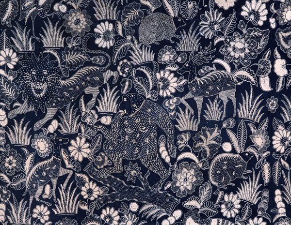 A batik kain (long cloth usually worn as a wrapper) with a design of elephants, lions, deer and other wild animals