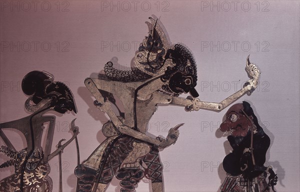 Wayang kulit shadow puppets used in popular all night performances, usually based on ancient Hindu epics such as the Ramayana