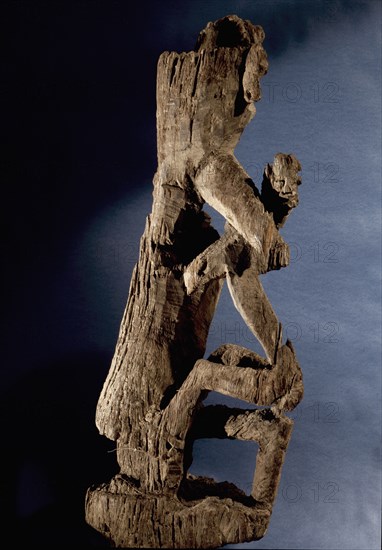 This figurative carving may be a bogy, serving as a site for a village guardian spirit, deterring strangers and enemies