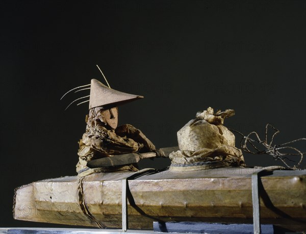 Two figures in a kayak a soul boat