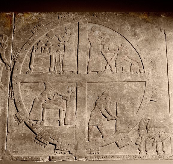 Carved slab from the southern wall of the throne room at Nimrud, depicting the camp of King Ashurnasirpal II