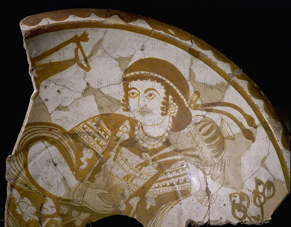 Pottery fragment with depiction of a young courtier filling a glass with wine