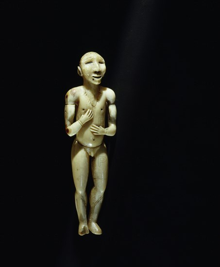 Finely modelled ivory figurine of a man