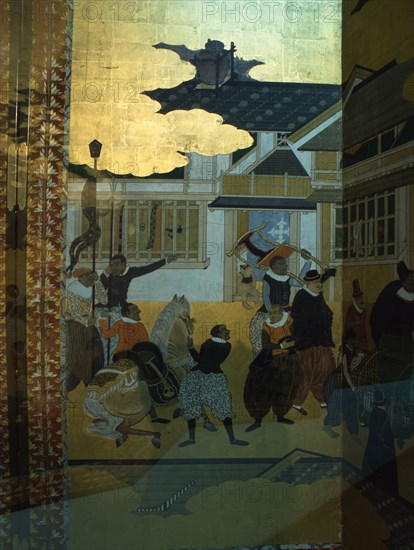 Detail from a folding namban jin or southern barbarian screen depicting a harbour scene recording the arrival of exotic looking Portuguese merchants in Japan