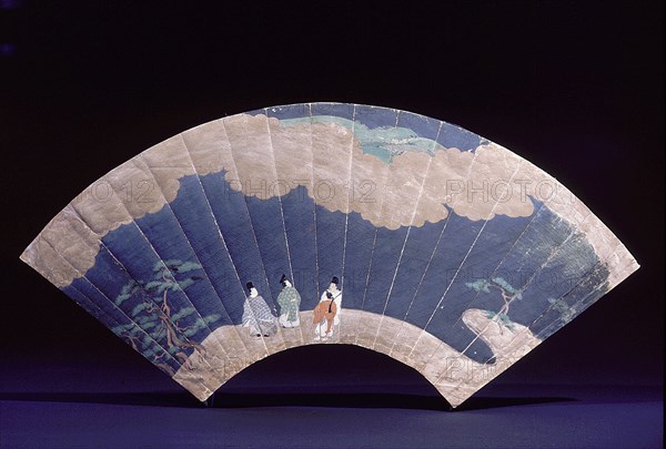 Tosa style fan decorated with a court scene depicting a party of noblemen