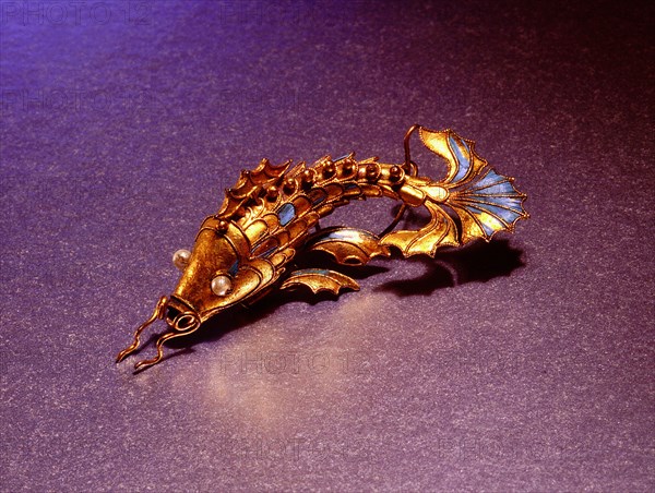 Silver gilt fish mounted on a hairpin