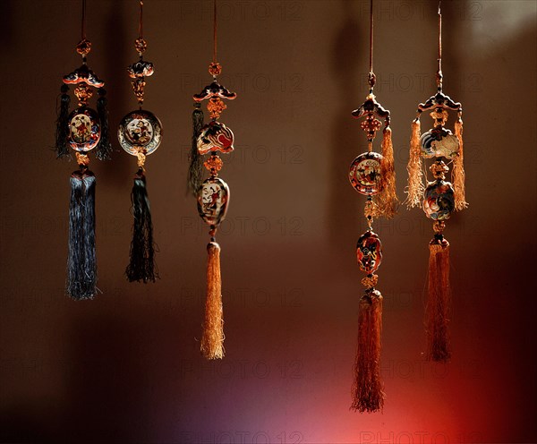 Pendants worn by young girls of marriageable age