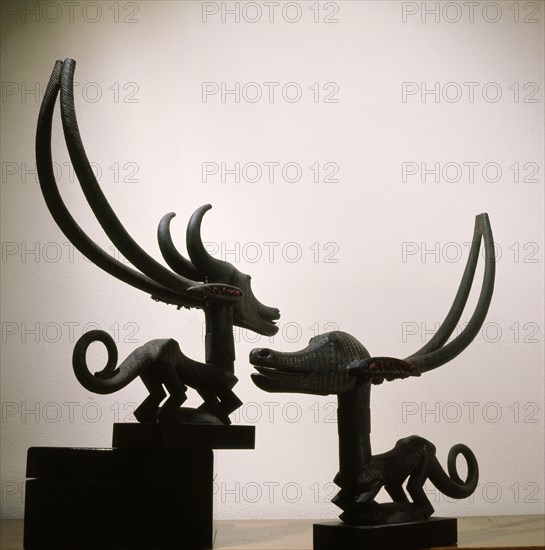 Chi Wara, depict a mythical hero combining aspects of man and antelope who taught men to till the fields