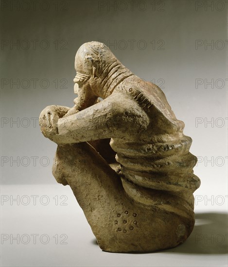 A terracotta figure of a man excavated from a tumulus in the Djenne/Mopti area between the Niger and Bani Rivers