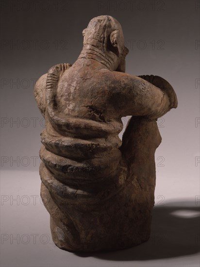 A terracotta figure of a man excavated from a tumulus in the Djenne/Mopti area between the Niger and Bani Rivers