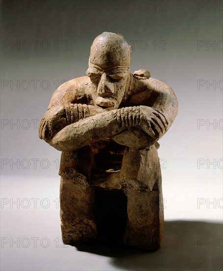 A terracotta figure of a man excavated from a tumulus in the Djenne/Mopti area between the Niger and Bani Rivers