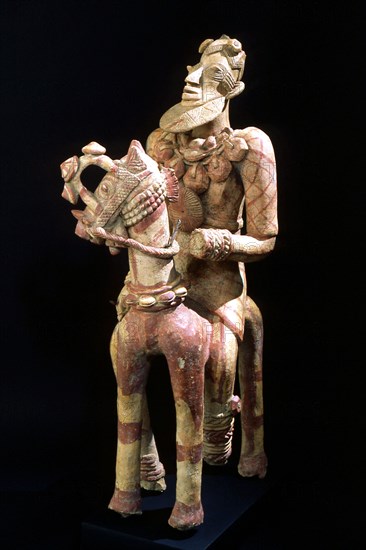 A terracotta horse mounted figure excavated from a tumulus in the Djenne/Mopti area