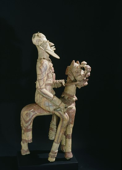 A terracotta horse mounted figure excavated from a tumulus in the Djenne/Mopti area