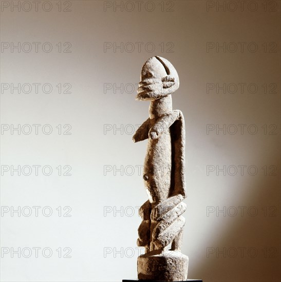 Dogon sculptures of this type depict their owner at prayer and serve as surrogates placed before an altar throughout a ritual addressed to the spirits