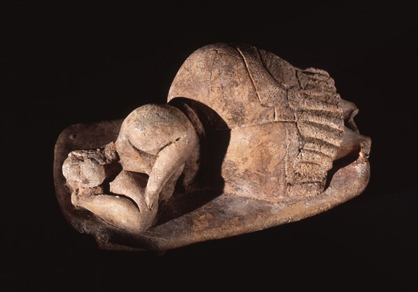 Figurine thought to represent a sleeping mother goddess or possibly a representation of Death and the eternal sleep