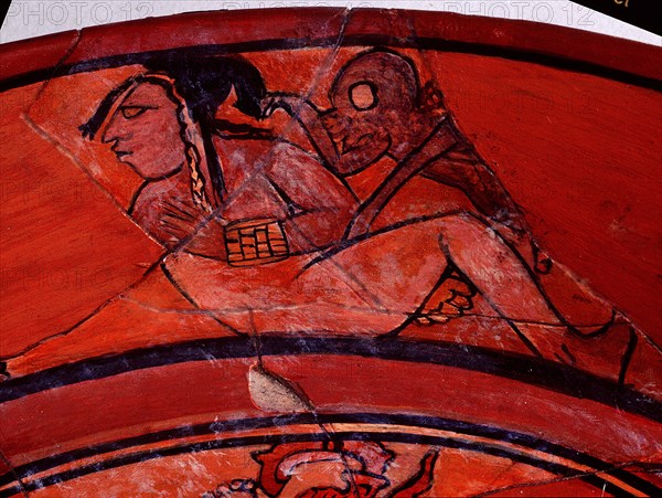 The rim of a dish showing spider monkeys, symbols of sexual excitement, fondling women