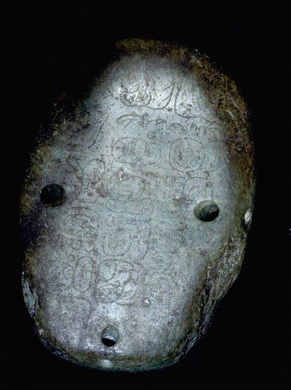 Jade portrait head inscribed with glyphs on reverse