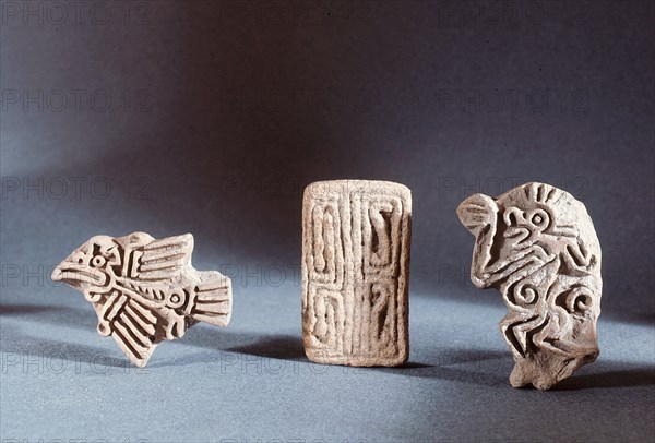 When attending festivals, the Aztecs wore face paint and probably used small pottery stamps such as these to imprint patterns on their cheeks