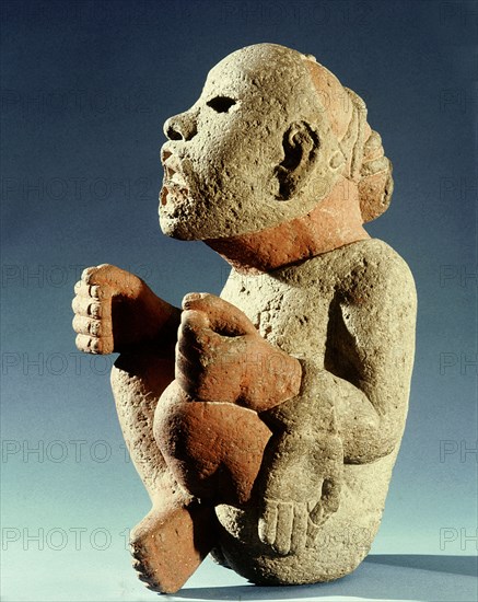 Xipe Totec, the Flayed Lord, dressed in the skin of a sacrificial victim