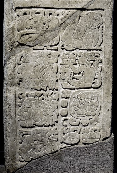 Lintel with glyphs carved in relief to represent a single date