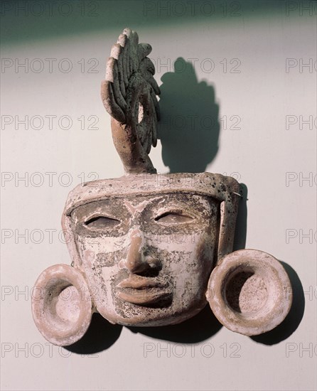 A ritual mask or possibly part of an incense burner