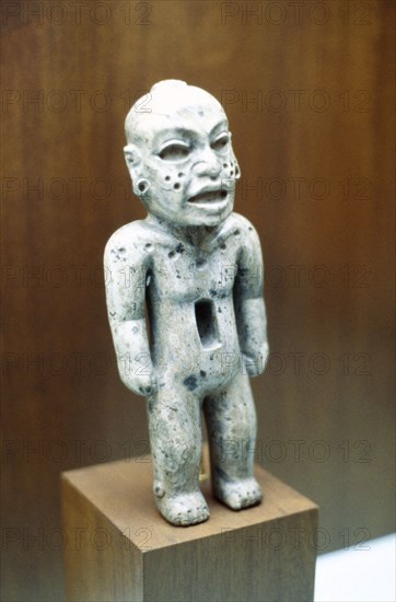 Greenstone figure of a man