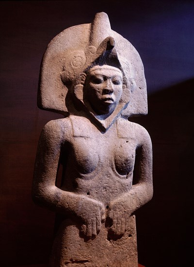 Carved stone figure
