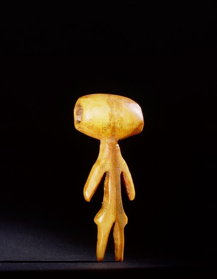 Ivory bead or pendant or toggle carved in semi human form
