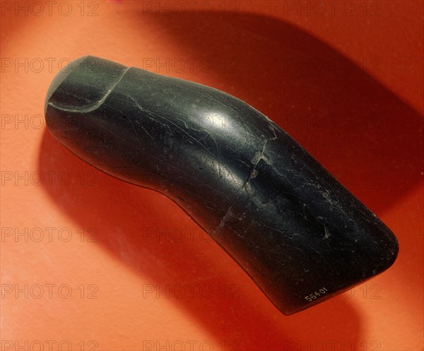 Thumb carved from cannel coal, a material which burns with a bright flame