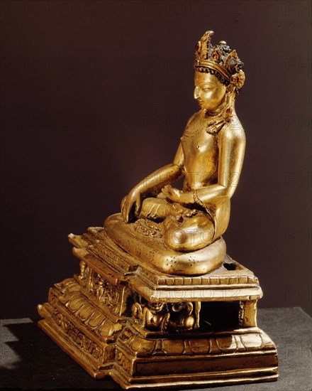 A figure of a seated Buddha