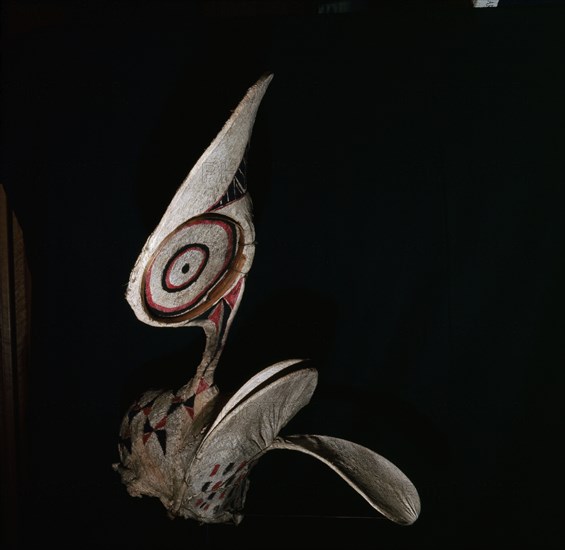 Large bark cloth mask, used by the Baining people in night time dances of the mens initiation society