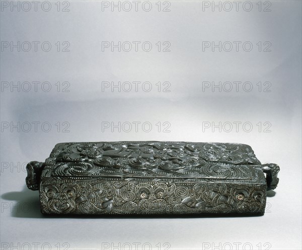 A papahou, flat treasure box, used to hold ornaments that had been worn on the head of a chief and were therefore tapu