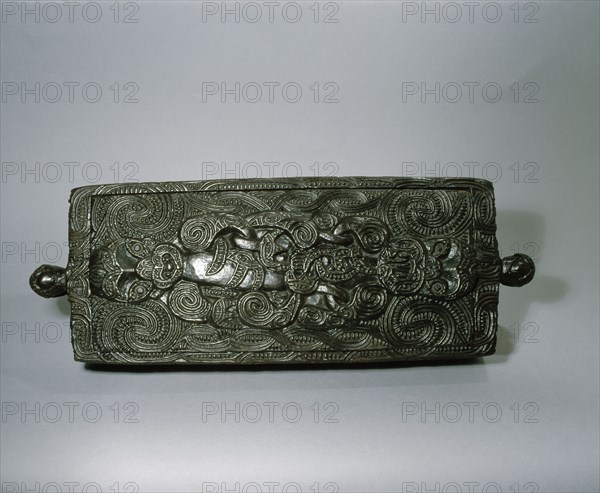 A papahou, flat treasure box, used to hold ornaments that had been worn on the head of a chief and were therefore tapu