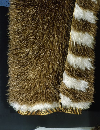 A kiwi feather cloak with a taniko tapestry border