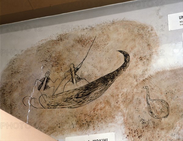 A reconstruction of a rock drawing of two men poling a mokihi, a raft canoe made from rushes