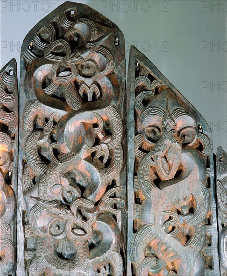 Five carved wooden end panels from a storehouse