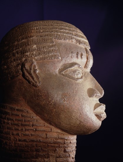 A terracotta head from the ancestral shrine of a leading member of the brass casting guild