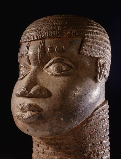 A terracotta head from the ancestral shrine of a leading member of the brass casting guild