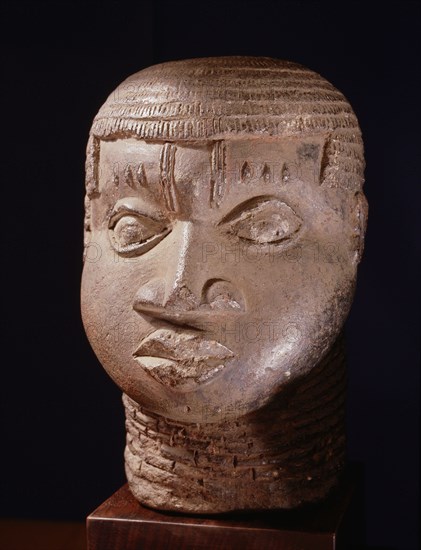 A terracotta head from the ancestral shrine of a leading member of the brass casting guild