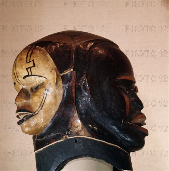 A janiform mask used in the Ekpo (ancestor spirit) secret society which formerly exercised governmental functions among the Ekoi