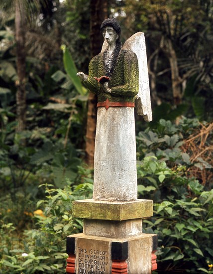 Wealth earned through the palm oil trade in the Niger Delta region financed a fashion for painted cement memorials where the deceased were depicted with the symbols of Christianity and European affluence