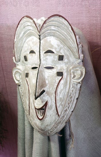 Igbo Okoroshi mask, one of the messengers of the water deity Owu, who performs during the annual one month New Yam festival known as Oma