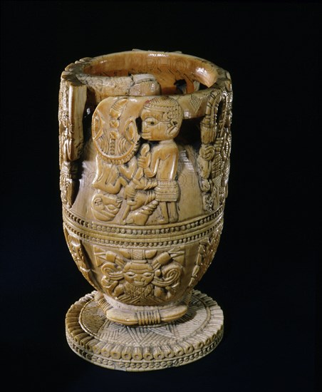 A carved ivory cup made by a craftsman from Owo, a Yoruba city state roughly halfway between Ife and Benin