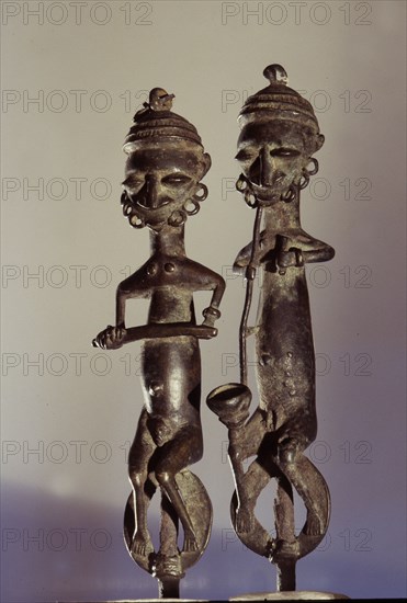 Paired brass staffs, known as edan ogboni which served as insignia for the senior men and women of the Ogboni society