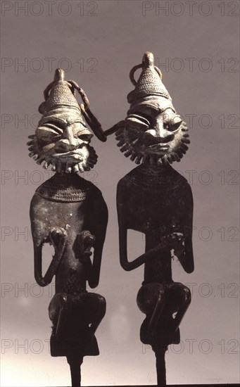 Paired brass staffs, known as edan ogboni which served as insignia for the senior men and women of the Ogboni society