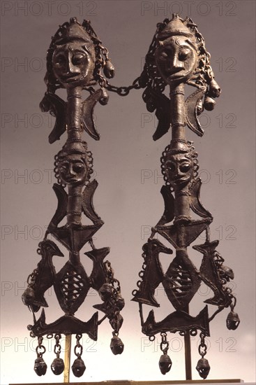 Paired brass staffs, known as edan ogboni which served as insignia for the senior men and women of the Ogboni society