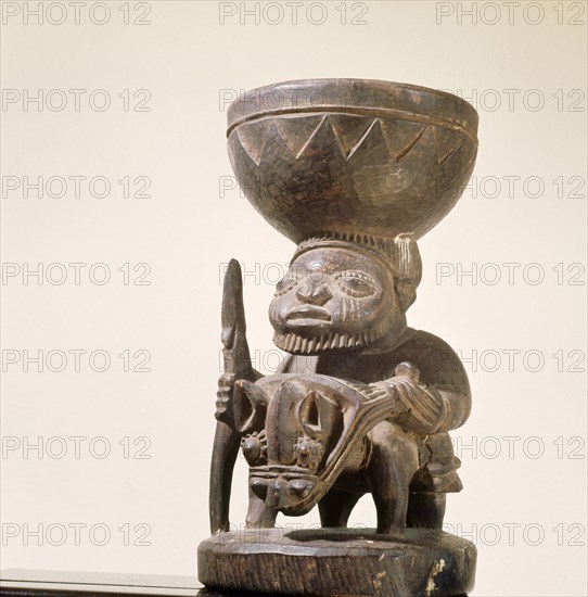 A bowl, agere ifa, in which the diviner stores his sacred palm nuts, ikin, used for consulting Ifa