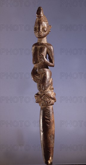 A wand or tapper used in the Yoruba Ifa divination cult