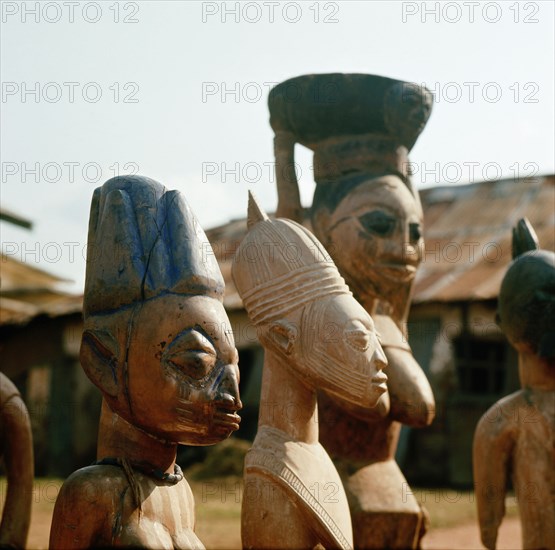 A shrine of Shango, the Yoruba god of thunder furnished with figures of women devotees