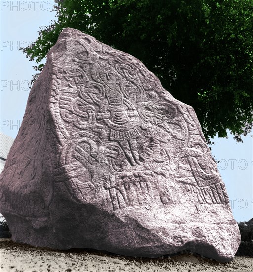 The Jelling stone was erected by King Harald Bluetooth, the first Christian king of Denmark, in memory of his parents